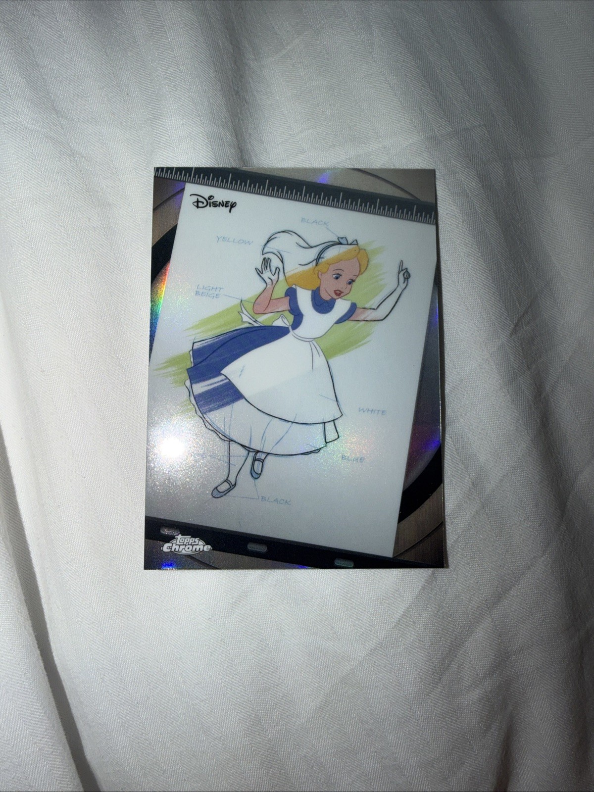 Inserto inchiostro e vernice 2026 Disney Topps Chrome Alice #I&P-8