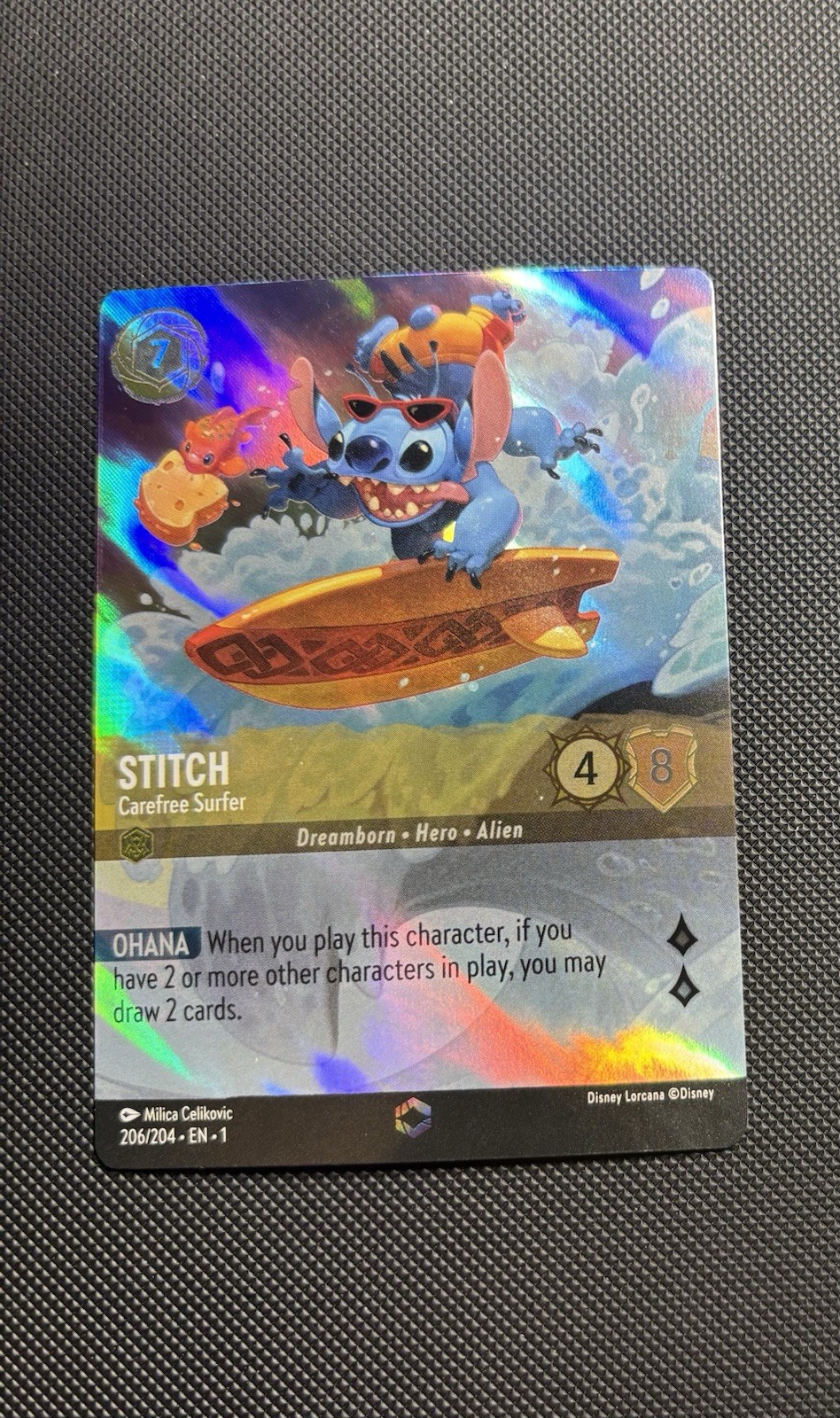 Disney Lorcana Il Primo Capitolo Stitch Surfer spensierato 206/204 INCANTATO