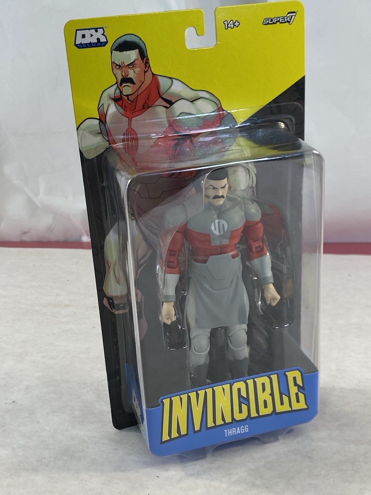 Super7 Invincible Thragg DX Deluxe Boxed Action Figure In Hand 