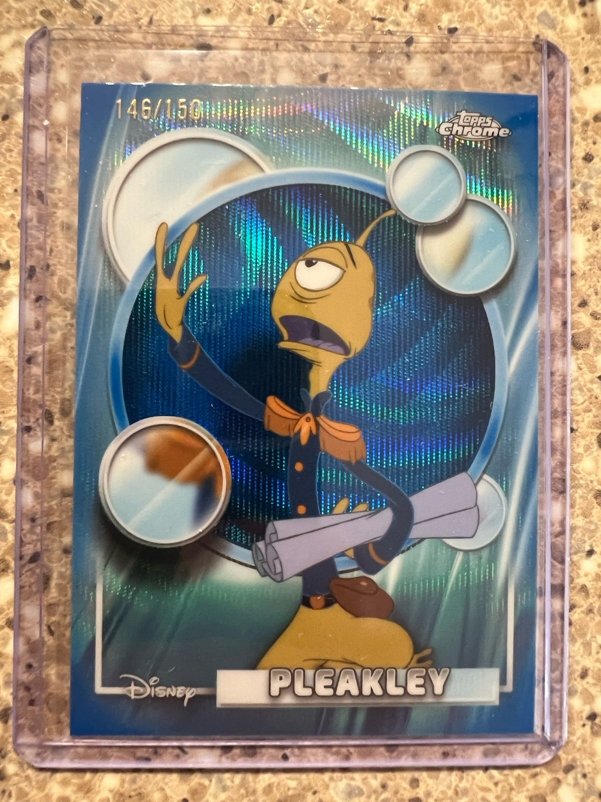 2026 Topps Chrome Disney Pleakley #154 rifrattore onda blu /150 Lilo & Stitch