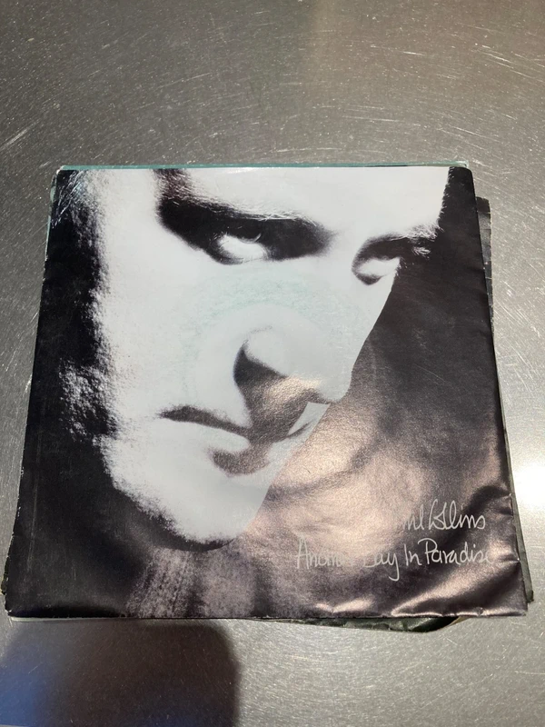 Phil Collins - Another Day in Paradise