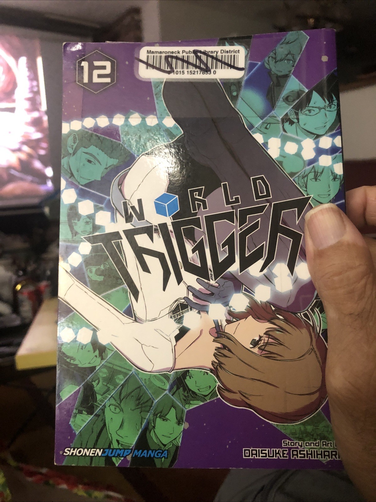 World Trigger, vol. 12 ex biblioteca inglesi