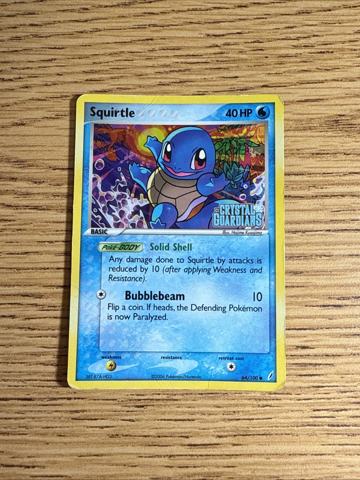 Squirtle 64/100 EX Crystal Guardians 2006 inglese timbrato reverse holo DANNEGGIATO