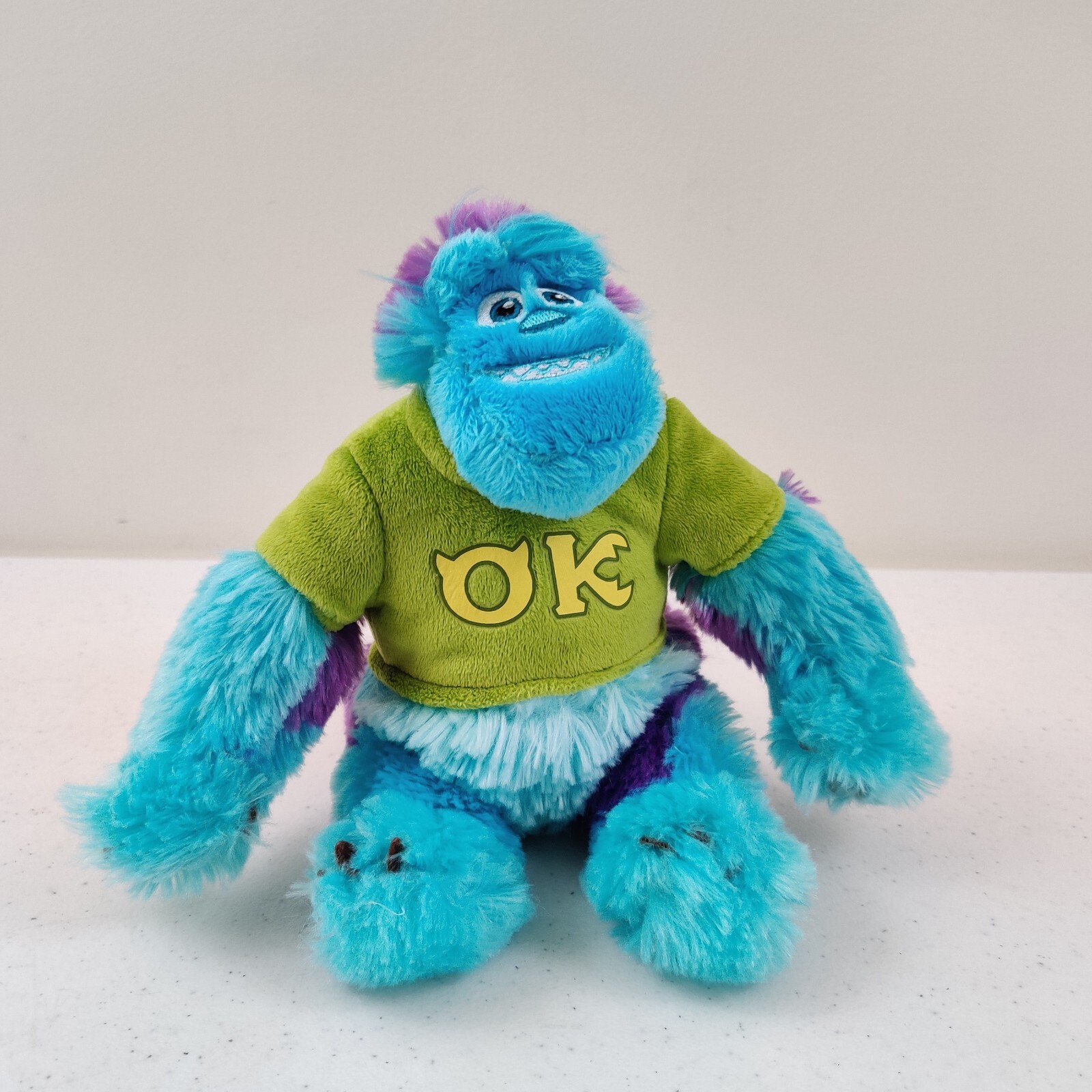 Disney Monsters University Inc Sully 7" Peluche OK Oozma Kappa Camicia Verde Sulley