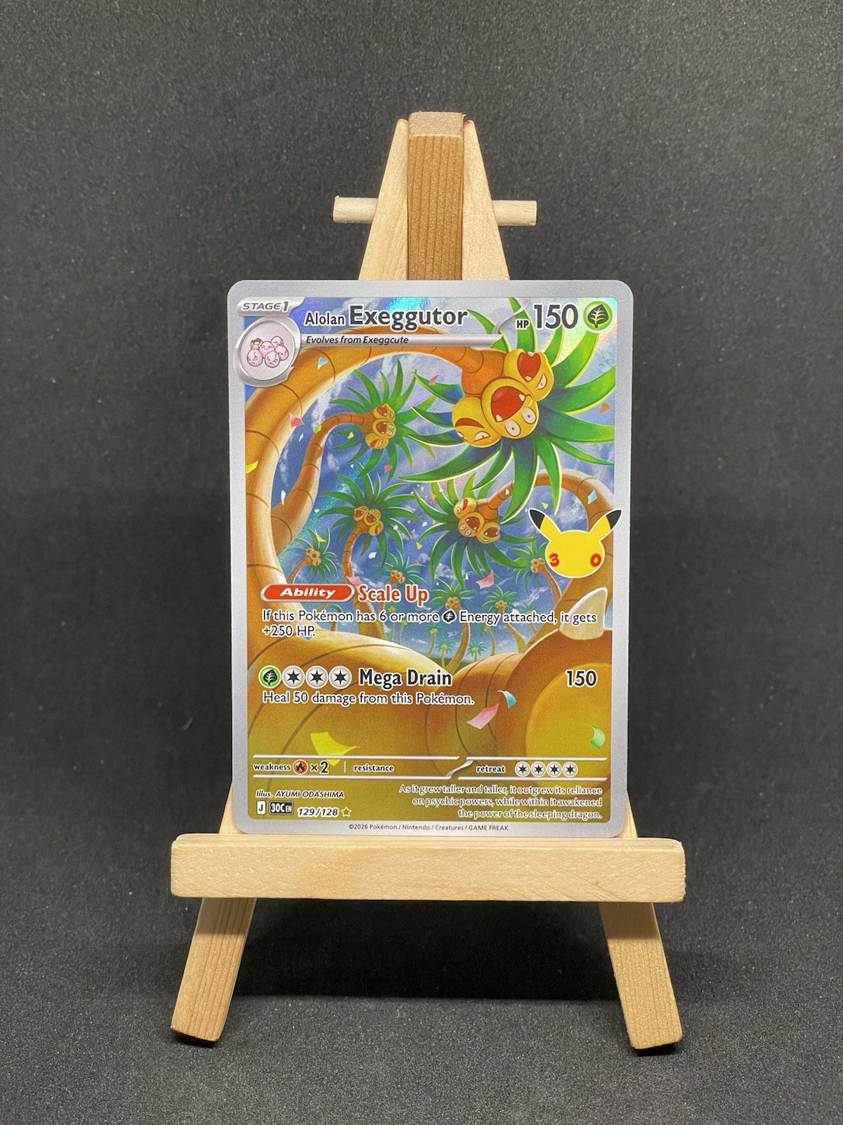 Alolan Exeggutor 129/128 ME: 30th Celebration Pokemon TCG Holo NM/M