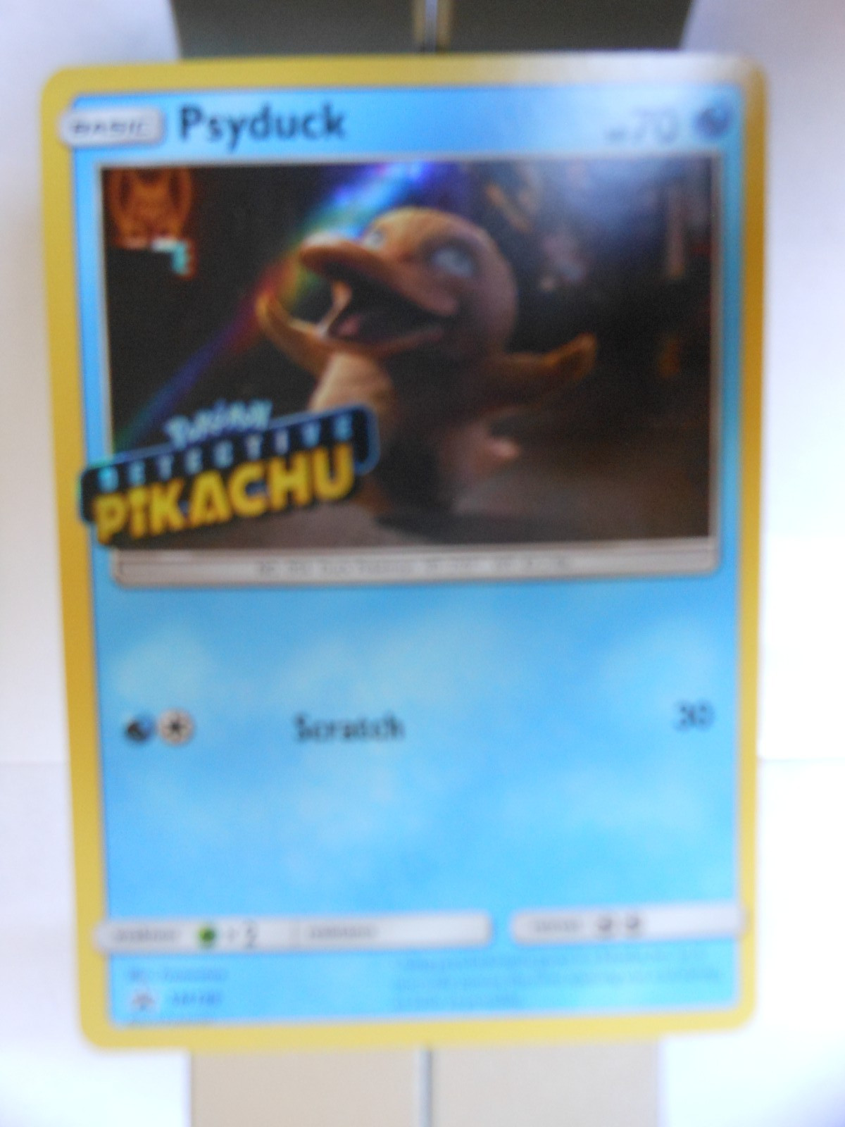 105pPKSM199 - Psyduck - Promo SM199 - Holo timbrato