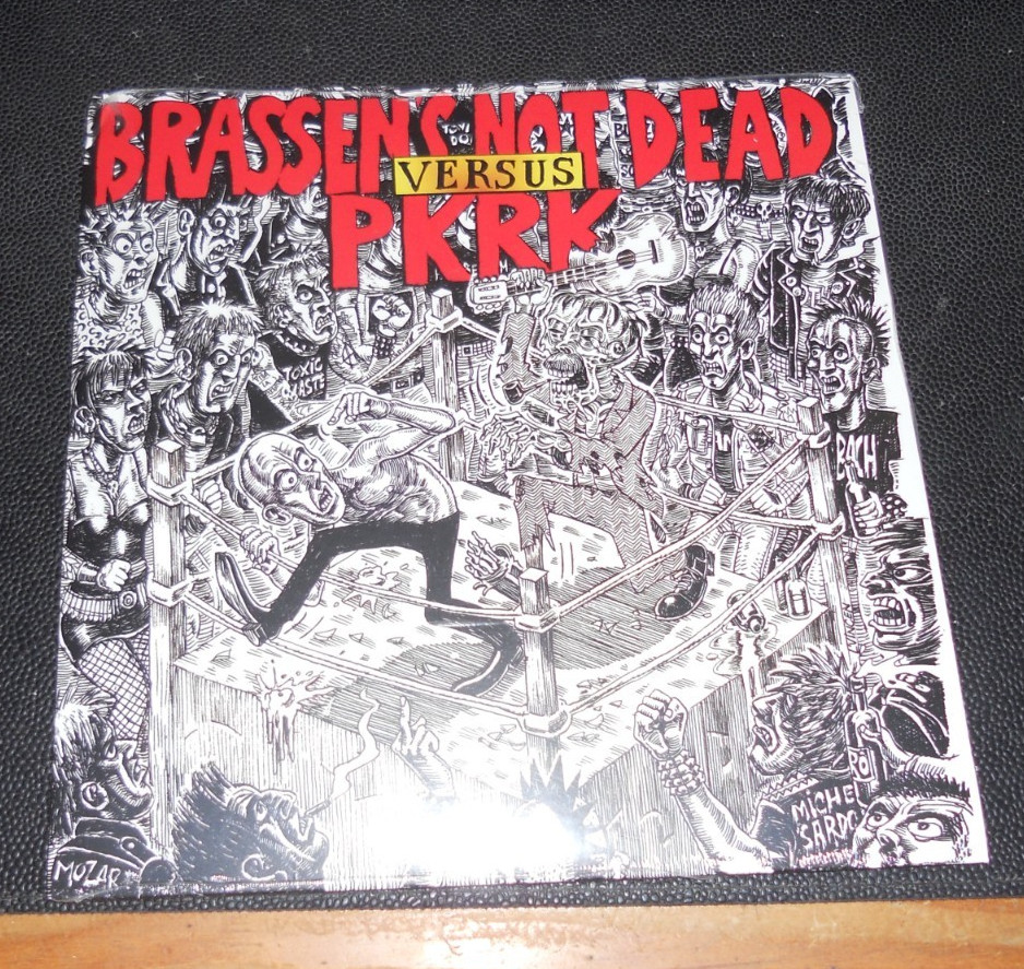 VINYL 45 TOURS PUNK BRASSEN'S NOT DEAD VERSUS PKRK NEUF SOUS BLISTER