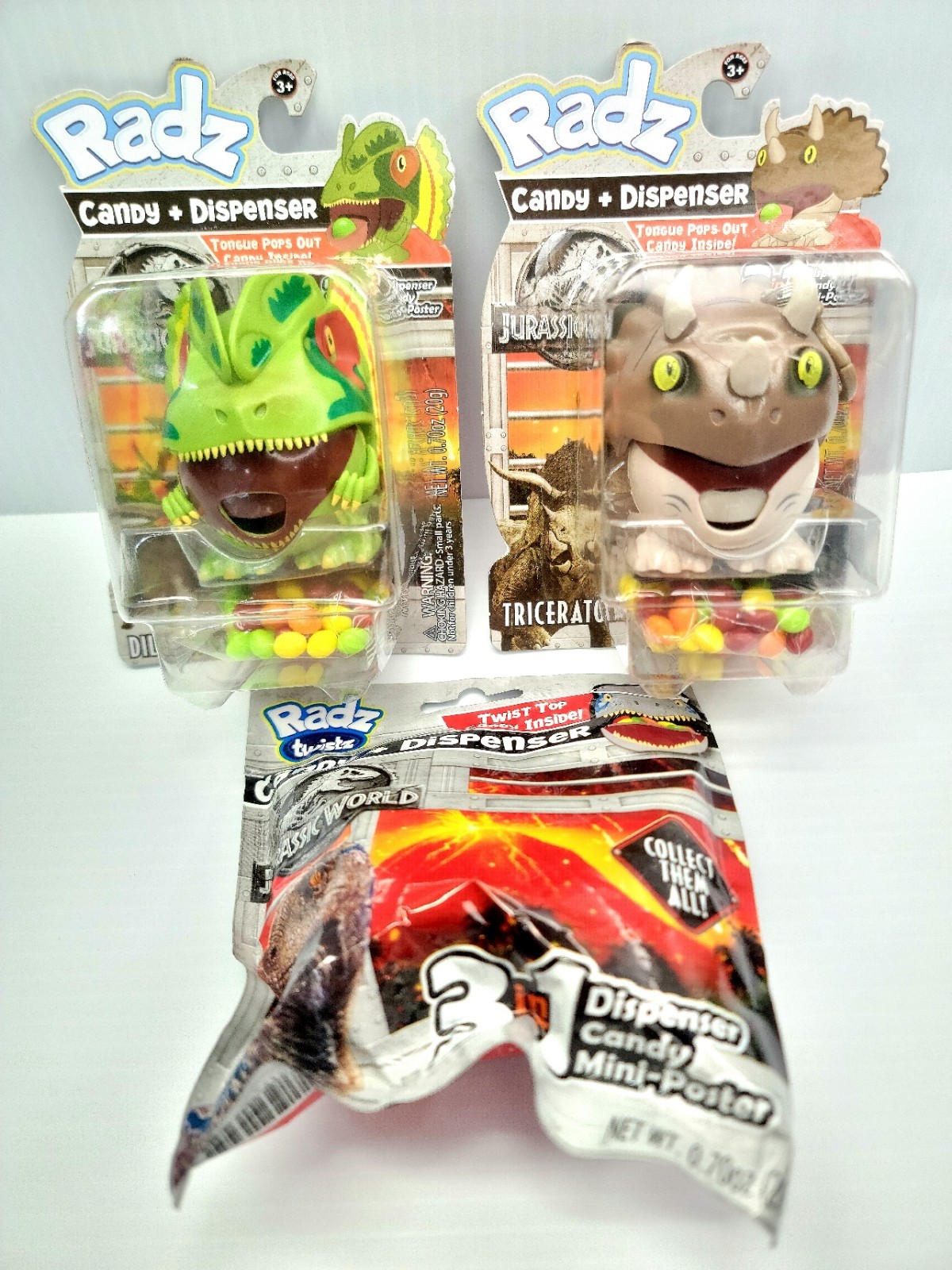 Dispenser caramelle Radz Jurassic World Dilophosaurus Triceratops dinosauri 2018