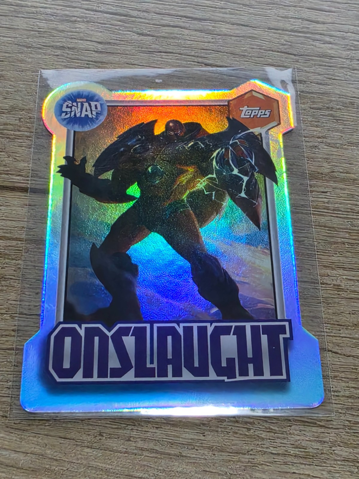 Inserto fustellato Holo 2026 Topps Neon Marvel Snap Onslaught MS-18