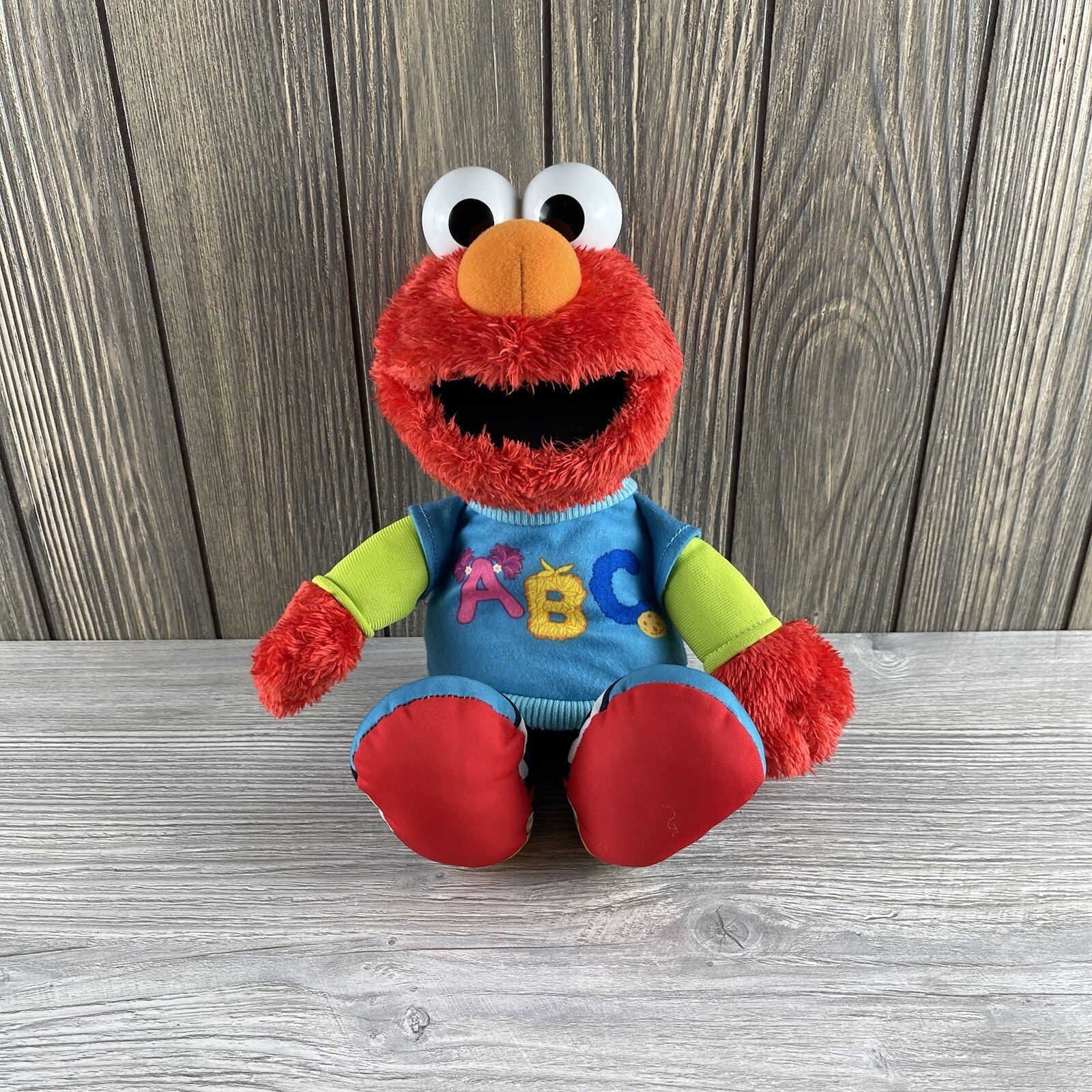 Peluche educativo Sesame Street ABC Elmo che canta parlante