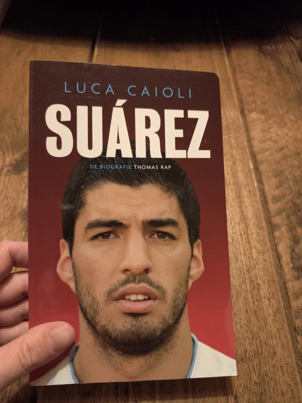 Suárez- Luca Caioli