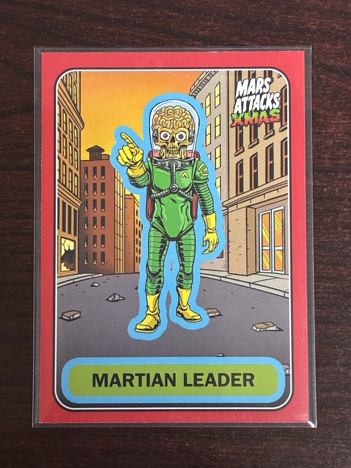 2026 Topps Mars Attacks Xmas Martian Leader #A-57 Rosso Natale Parallelo