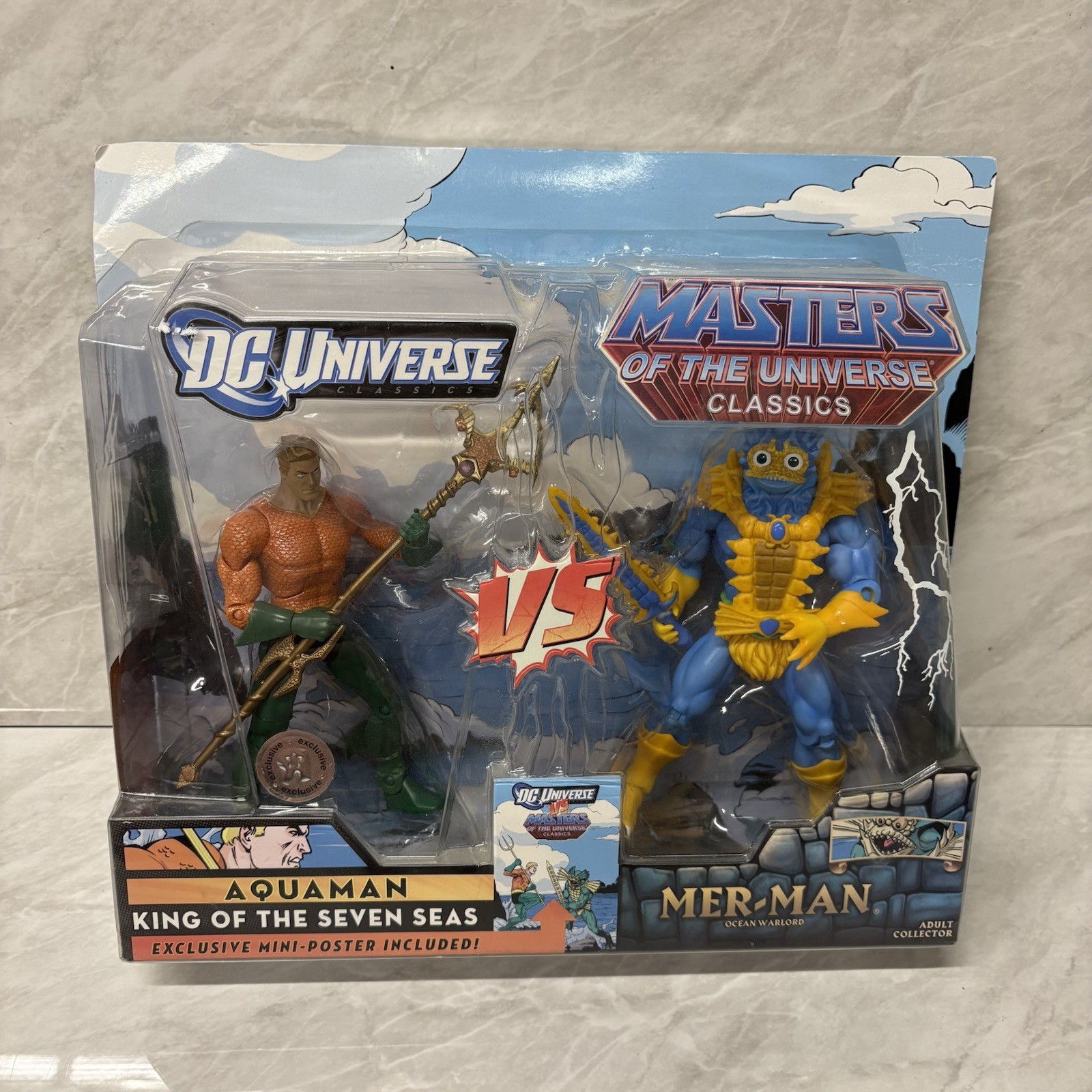 DC Universe Aqua Man Vs Masters Of The Universe Mer Man Set di Figure