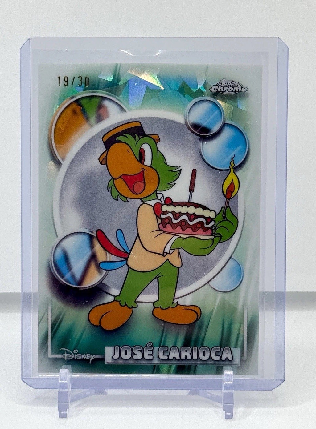 2026 Topps Chrome Disney Sapphire Jose Carioca #97 rifrattore bianco #/30