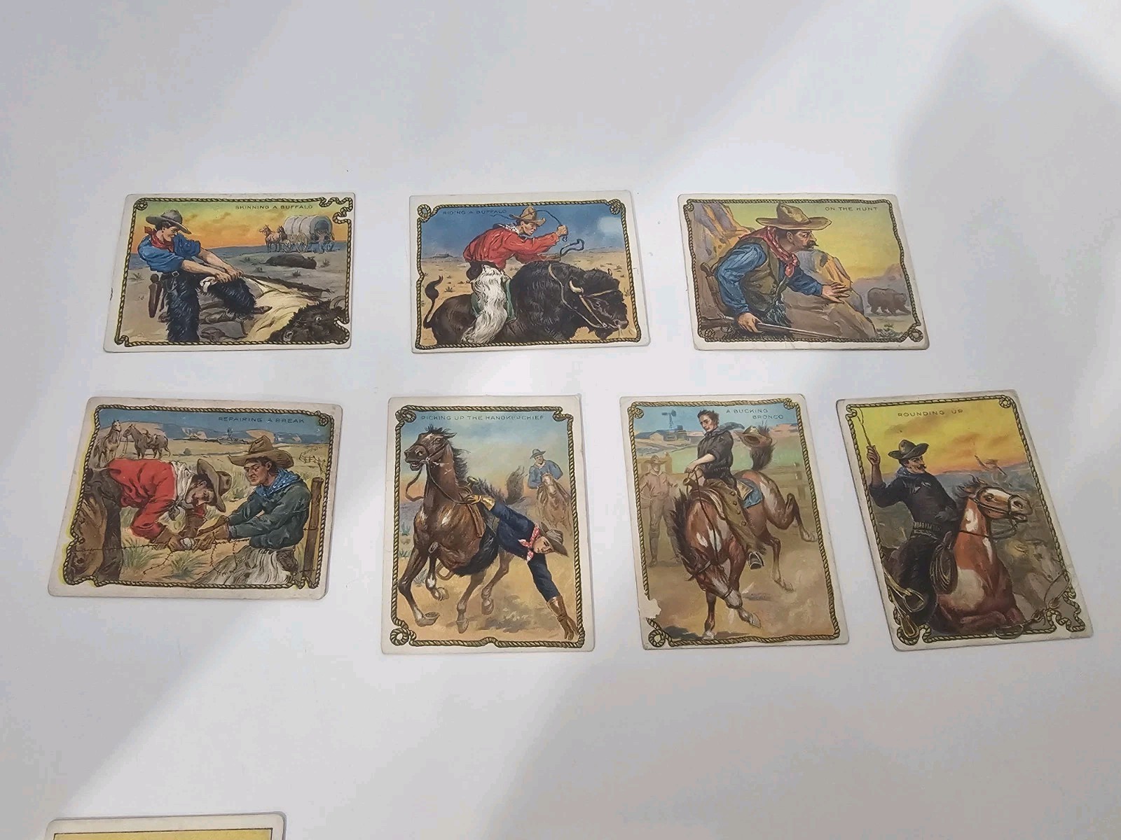 (8) 1909/10  COWBOY SERIES HASSAN LOT OF 8 Cigarette Cards. See Pics & Descp.