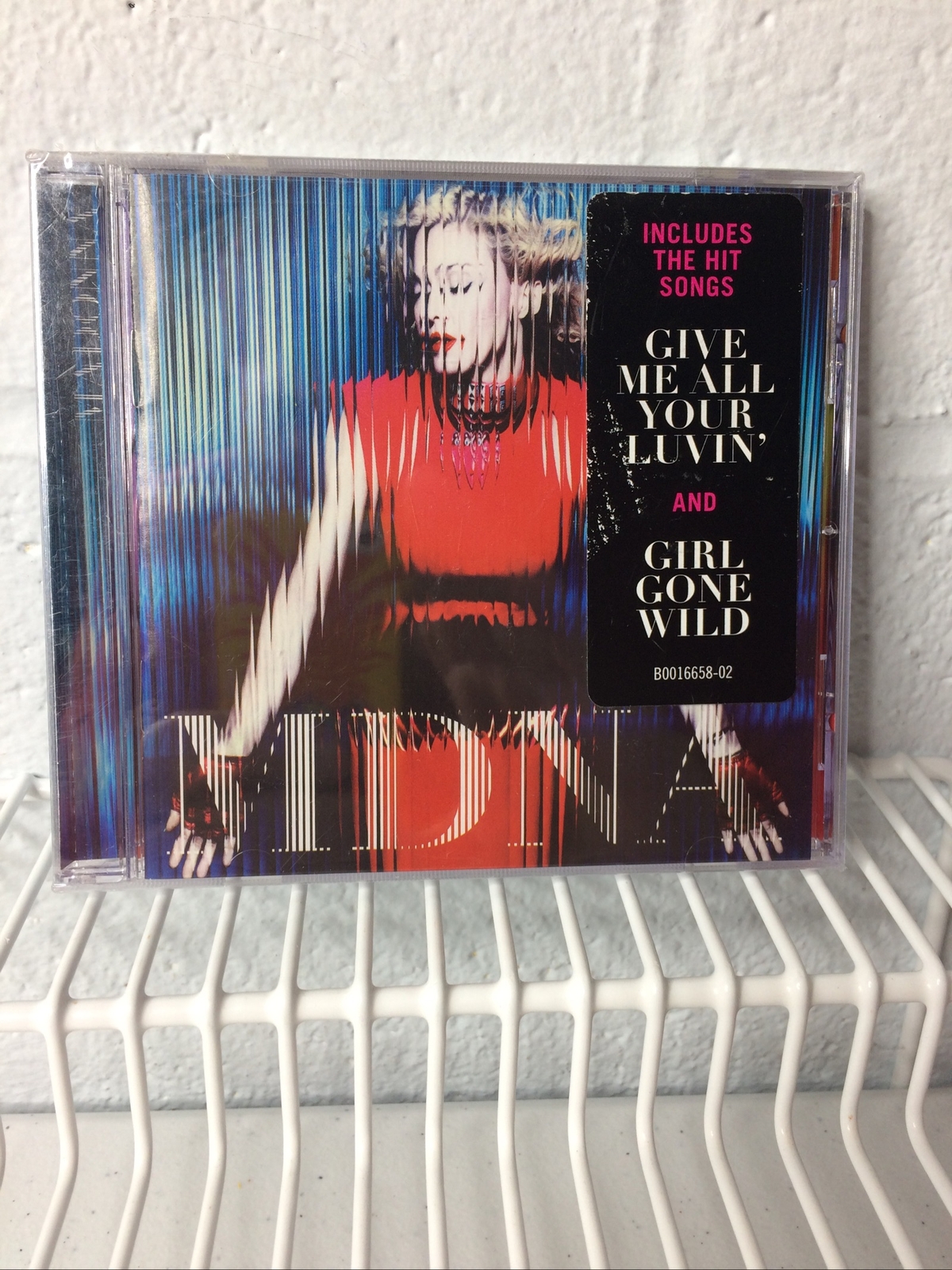 Madonna MDNA CD  includes Give Me All Your Luvin & Girl Gone Wild Sealed