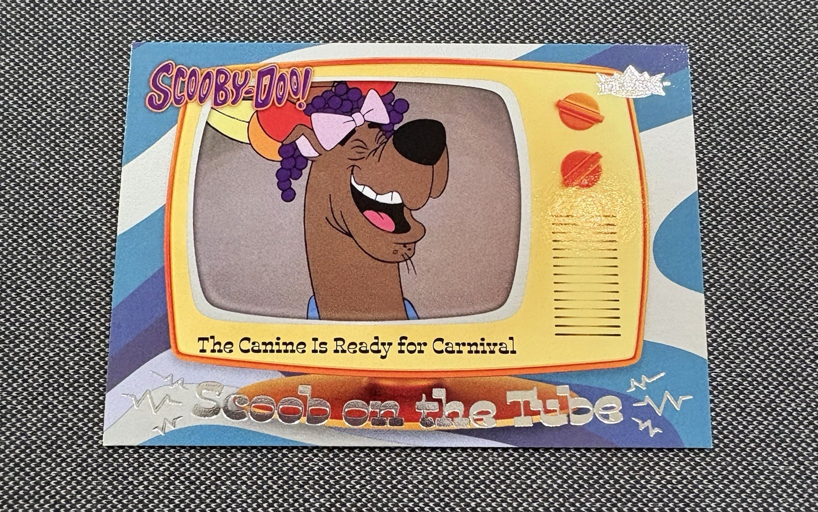 2025 UD FLEER SCOOBY-DOO #ST-17 “SCOOB ON THE TUBE” - Jaguaro