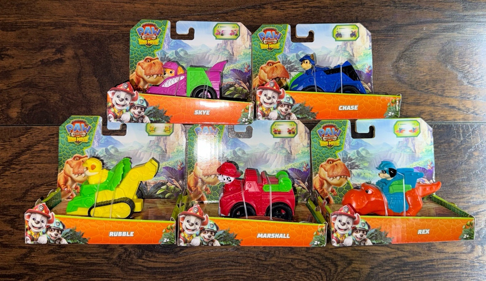 PAW Patrol Dino Movie Vehicle Set di 5 Chase Skye Marshall Rubble Rex Nuovo