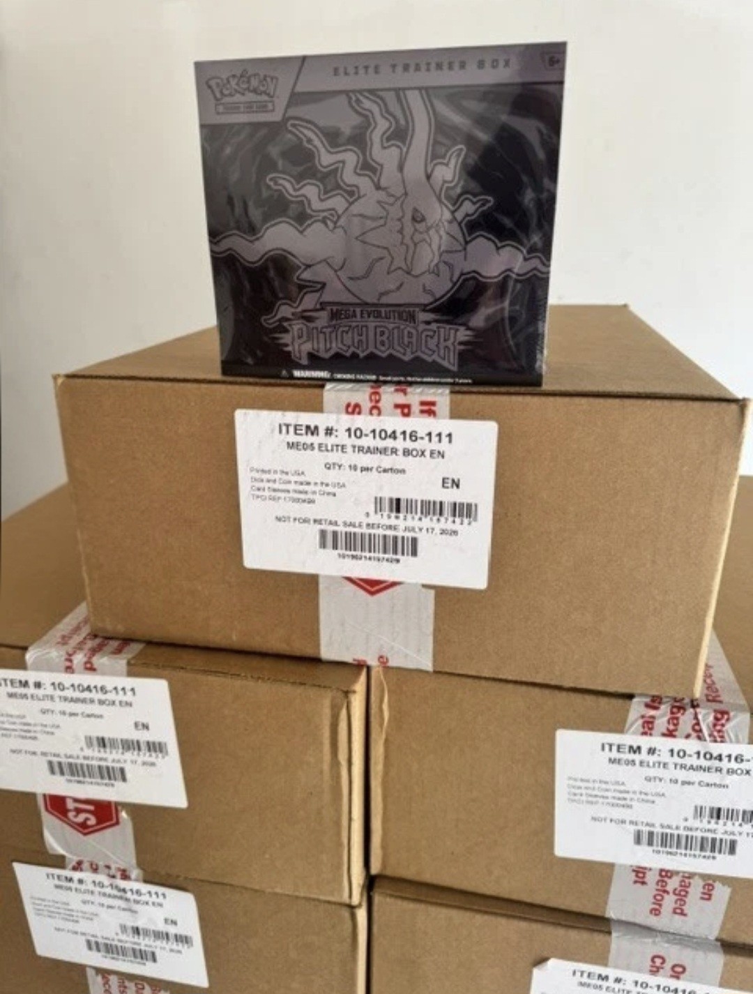 Pokemon Mega Evolution Pitch Black Elite Trainer 10 Box Case sigillato in fabbrica