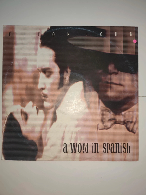 Elton John "A World in Spanish" Disque vinyle 12"