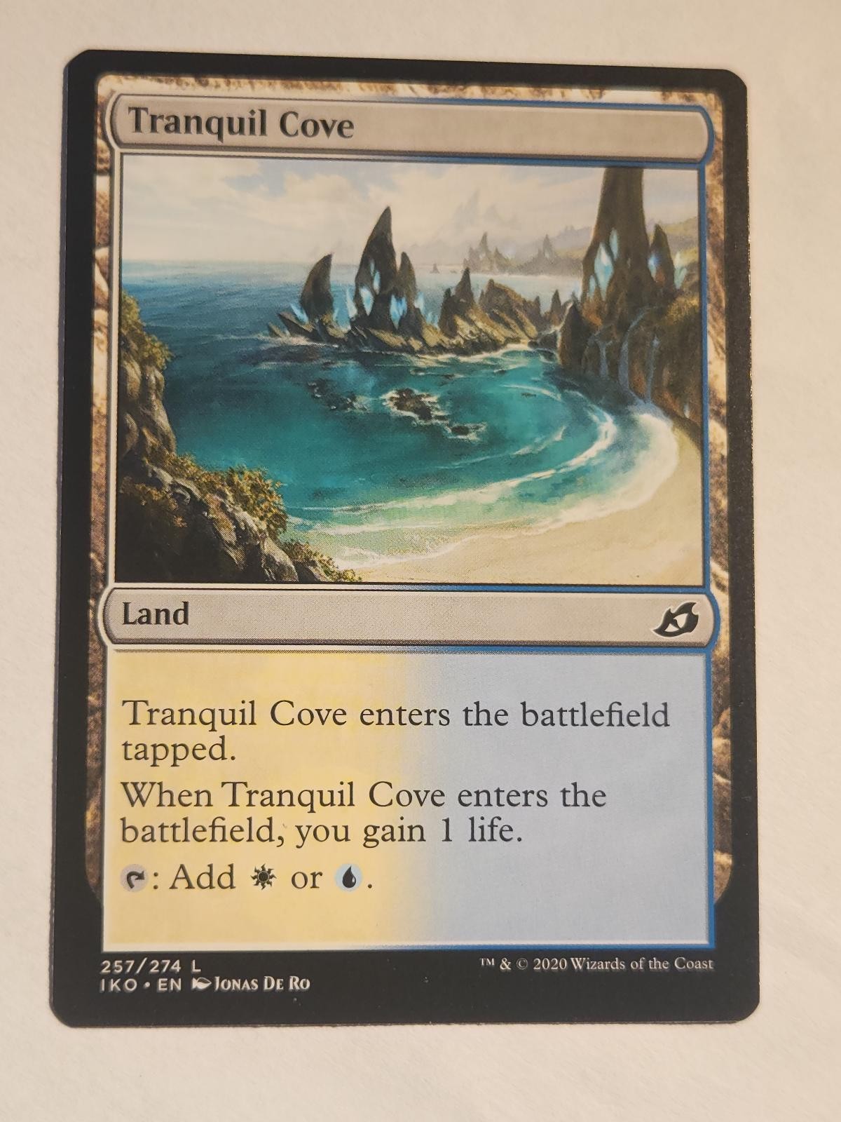 Tranquil Cove 257 Ikoria: Tana dei Behemoth Magic: The Gathering Land LP