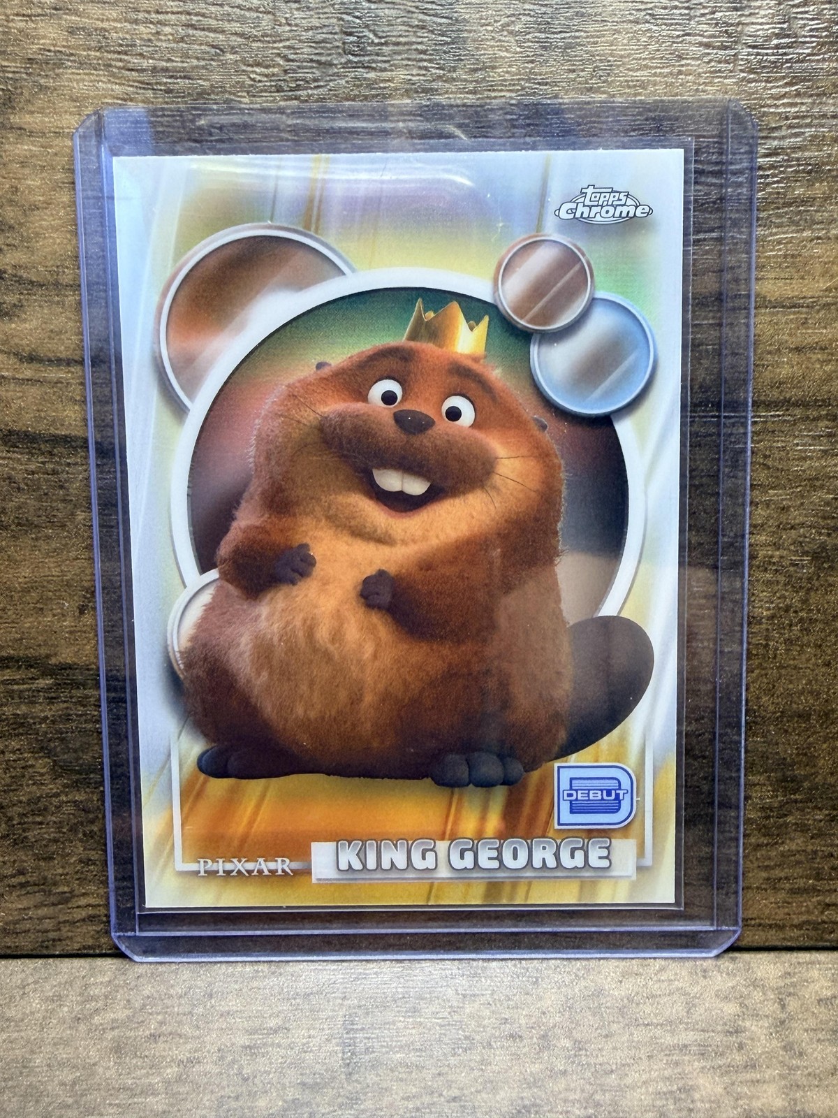 Disney Pixar Topps Chrome King George 111 Rifrattore Trading Card 2022 Debutto