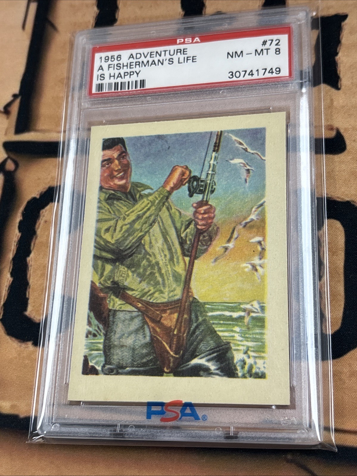 1956 ADVENTURE 72 A FISHERMAN'S LIFE IS HAPPY PSA 8