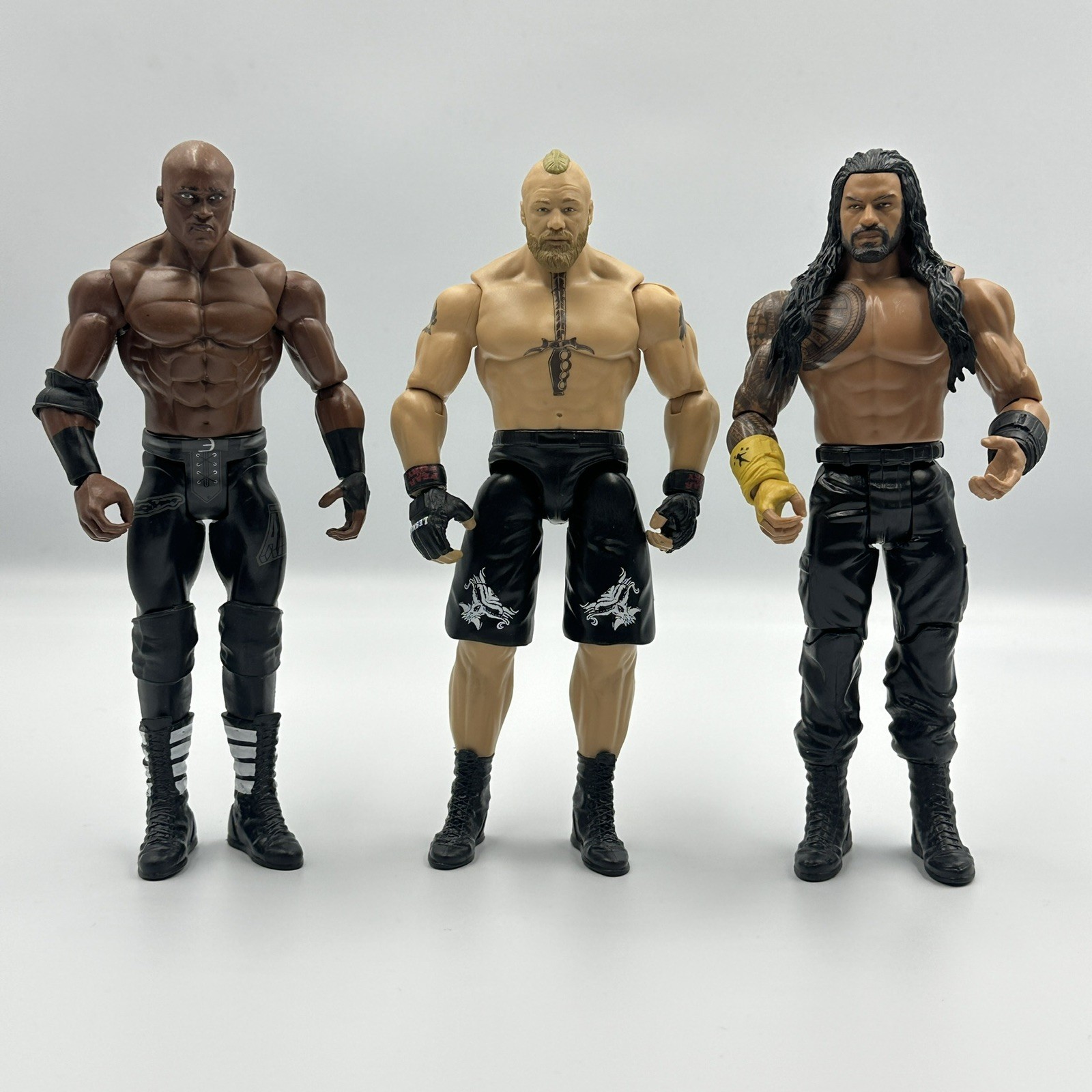 Pacchetto figurine WWE Brock Lesnar vs Bobby Lashley vs Roman Reigns Wrestling