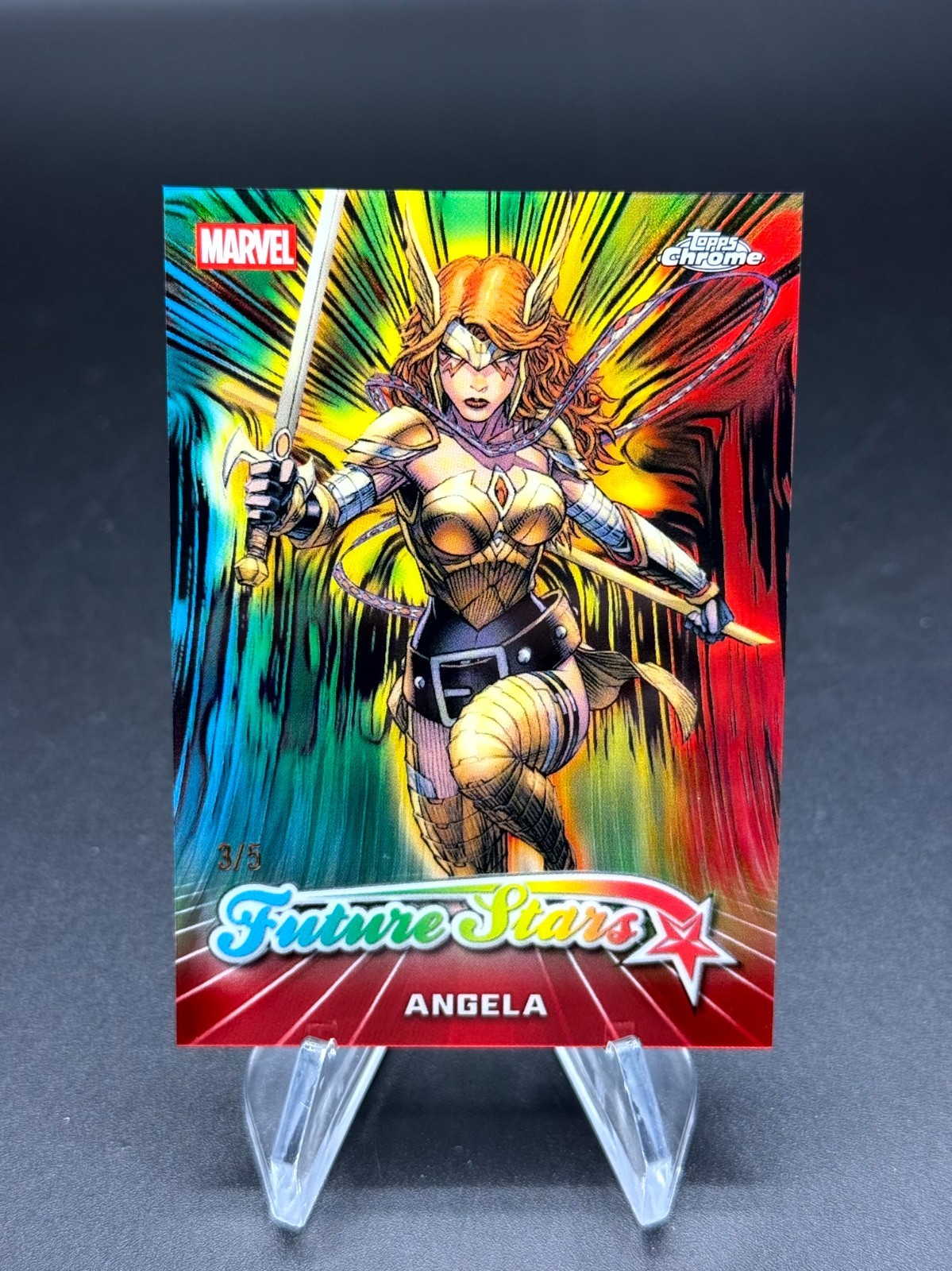 Angela 2026 Topps Chrome Marvel Future Stars rifrattore rosso #/5