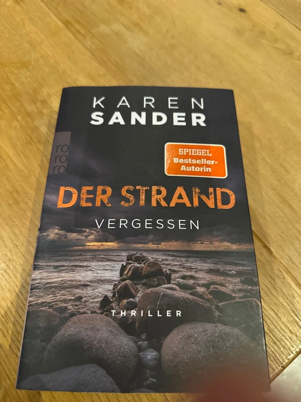 Der Strand vergessen, Karen, Sander