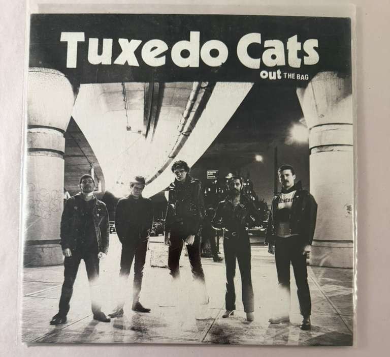 TUXEDO CATS – OUT THE BAG - 7" BLACK VINYL LP 45RPM C2022 REM16 REMINDER RECORDS