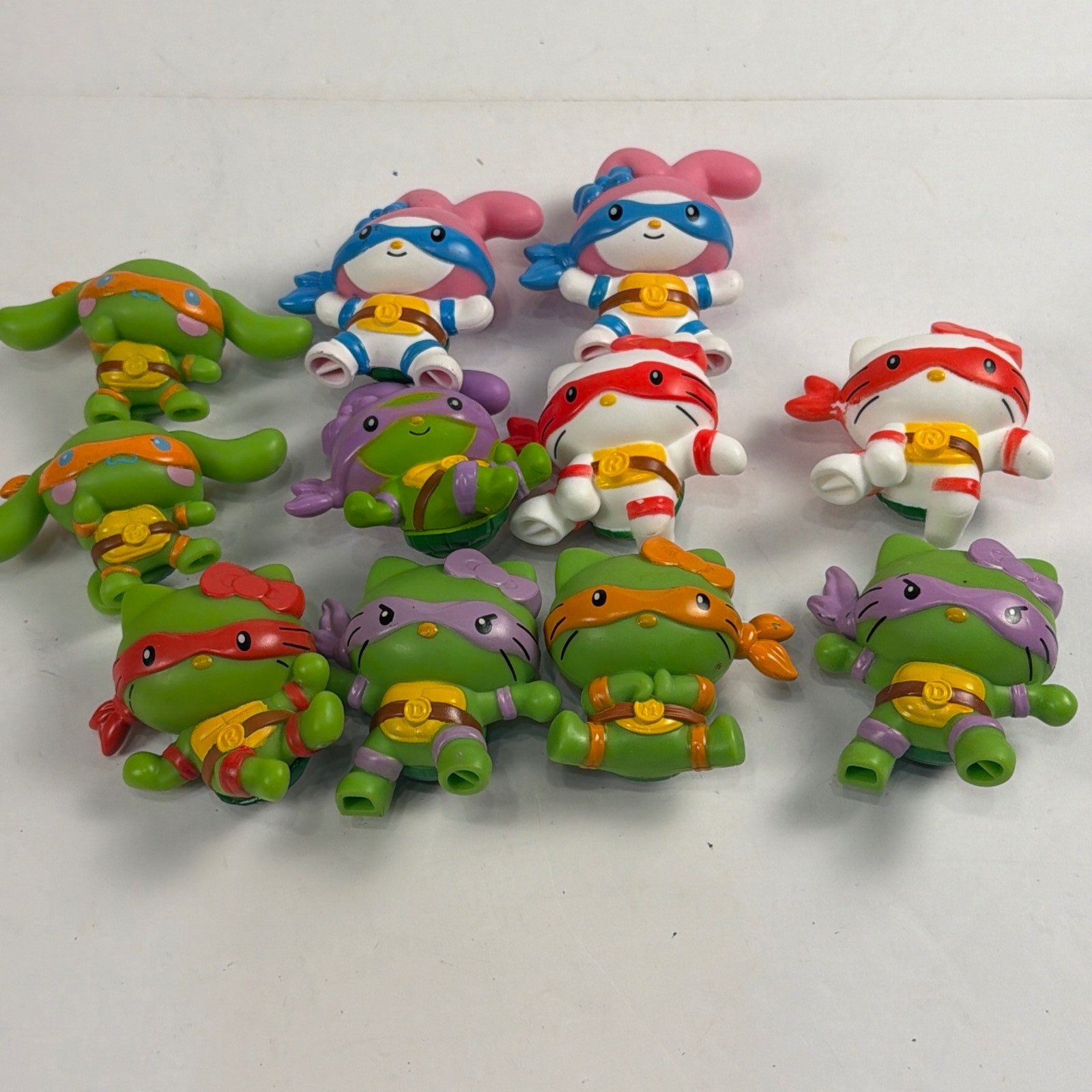 MCDONALDS SANRIO HELLO KITTY X TEENAGE MUTANT NINJA TURTLES FIGURE LOTTO di 11