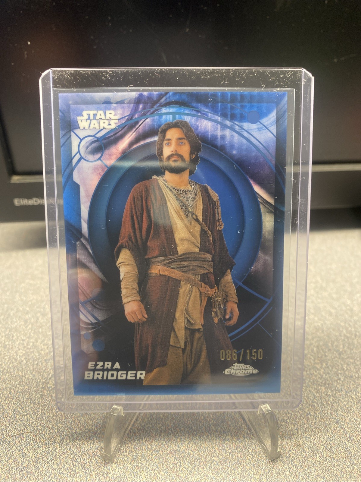 2026 Topps Chrome Star Wars- #21 Ezra Bridger Blue Refractor /150