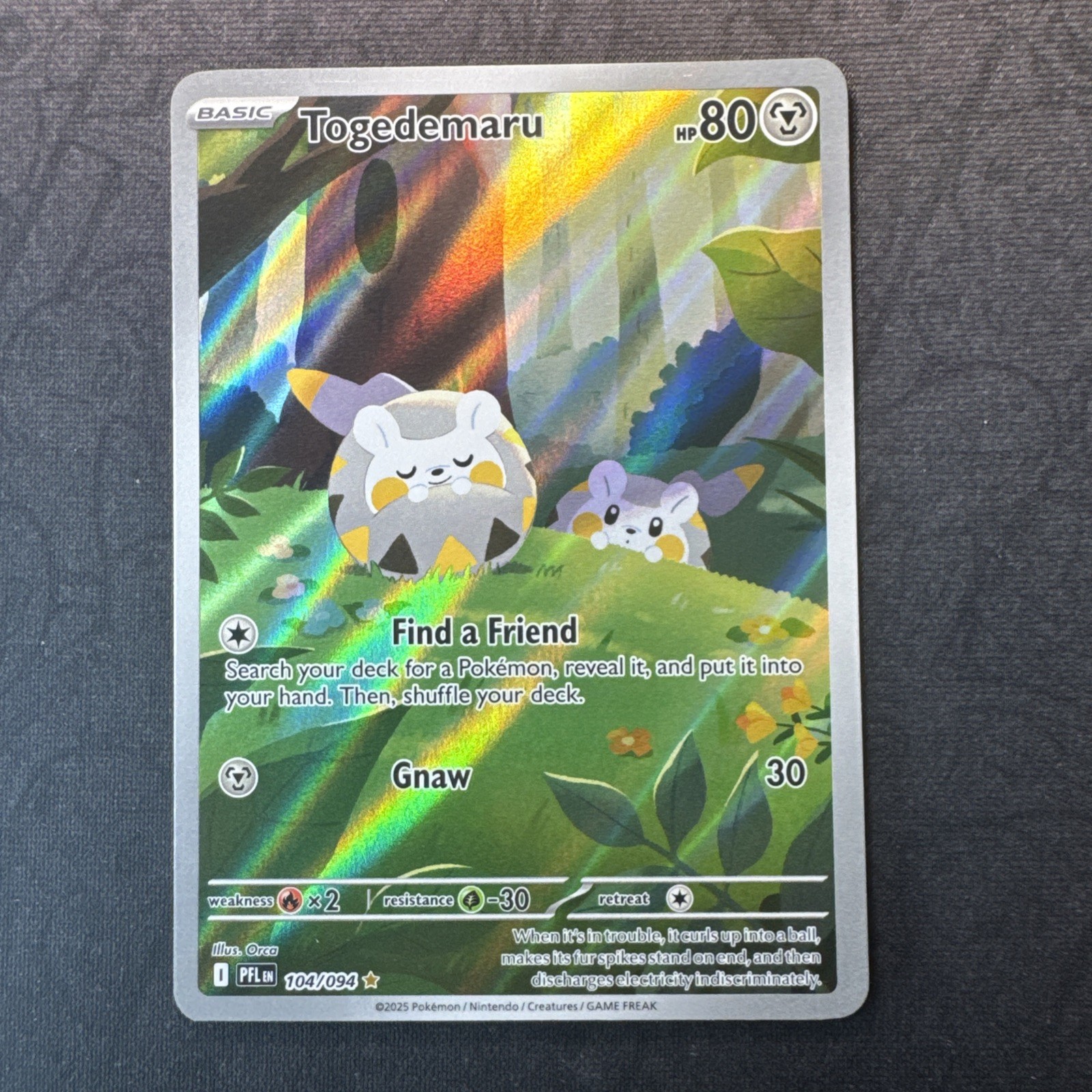 Togedemaru 104/094 Me02: Fiamme Fantastiche Holo Pokemon