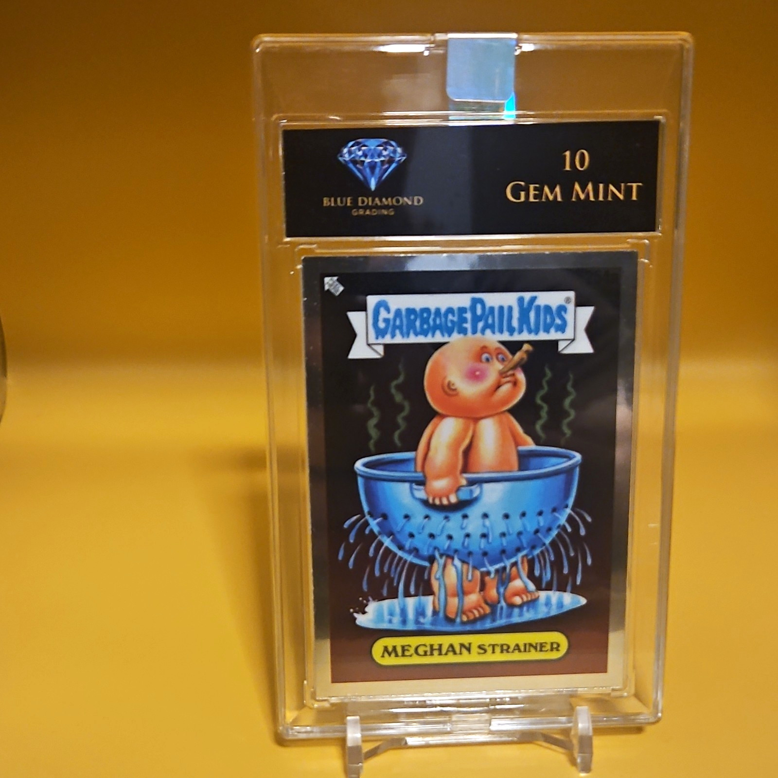 Topps Garbage Pail Kids 2023 colino Meghan #143a gemma classificata come nuovo 10