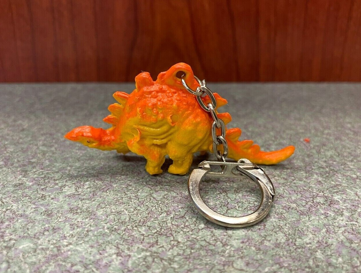 Portachiavi dinosauro plastica vintage 2,5" stegosauro giallo arancione anello dinosauro fob