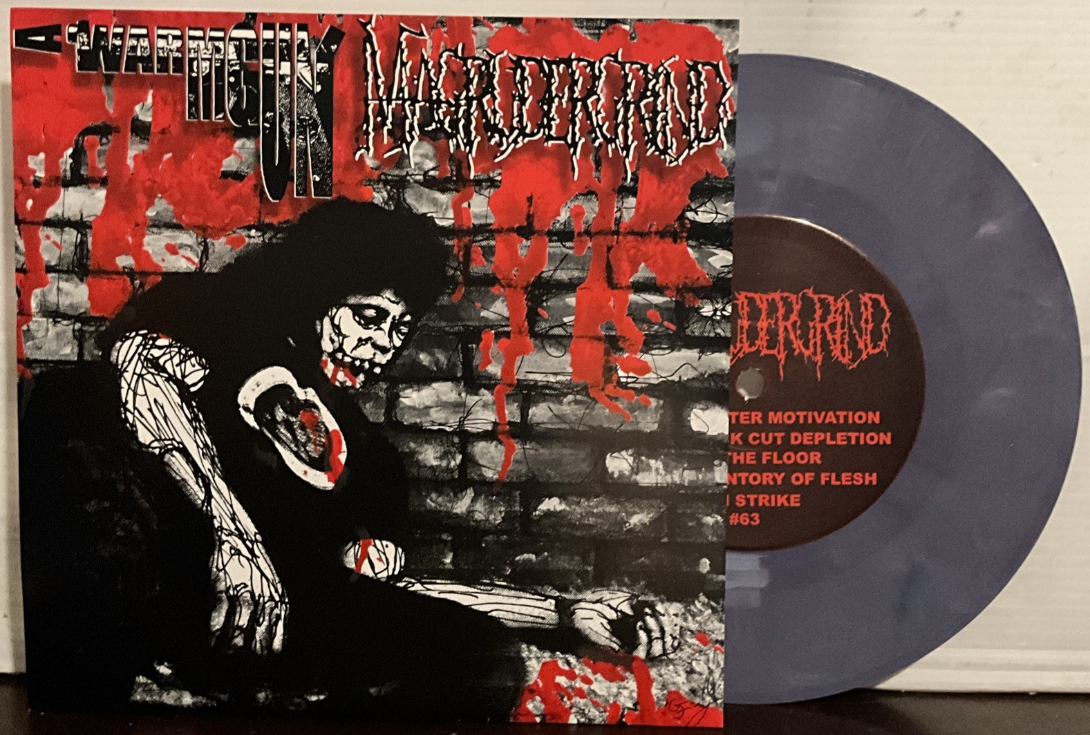 Magrudergrind / A Warm Gun - Split 7’’ EP 2005 Misfire Records – #1 [Gray] EX/EX