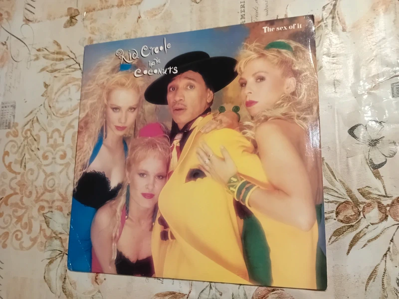 Mix "12 Kid Creole and the coconuts- the sex of it