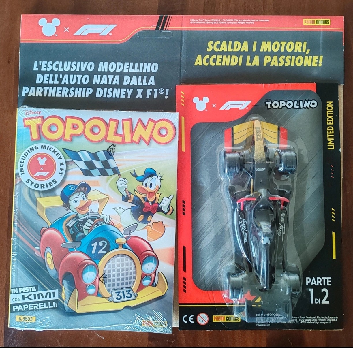 Topolino 3693 Disney  in pista Kimi paperelli + modellino f1